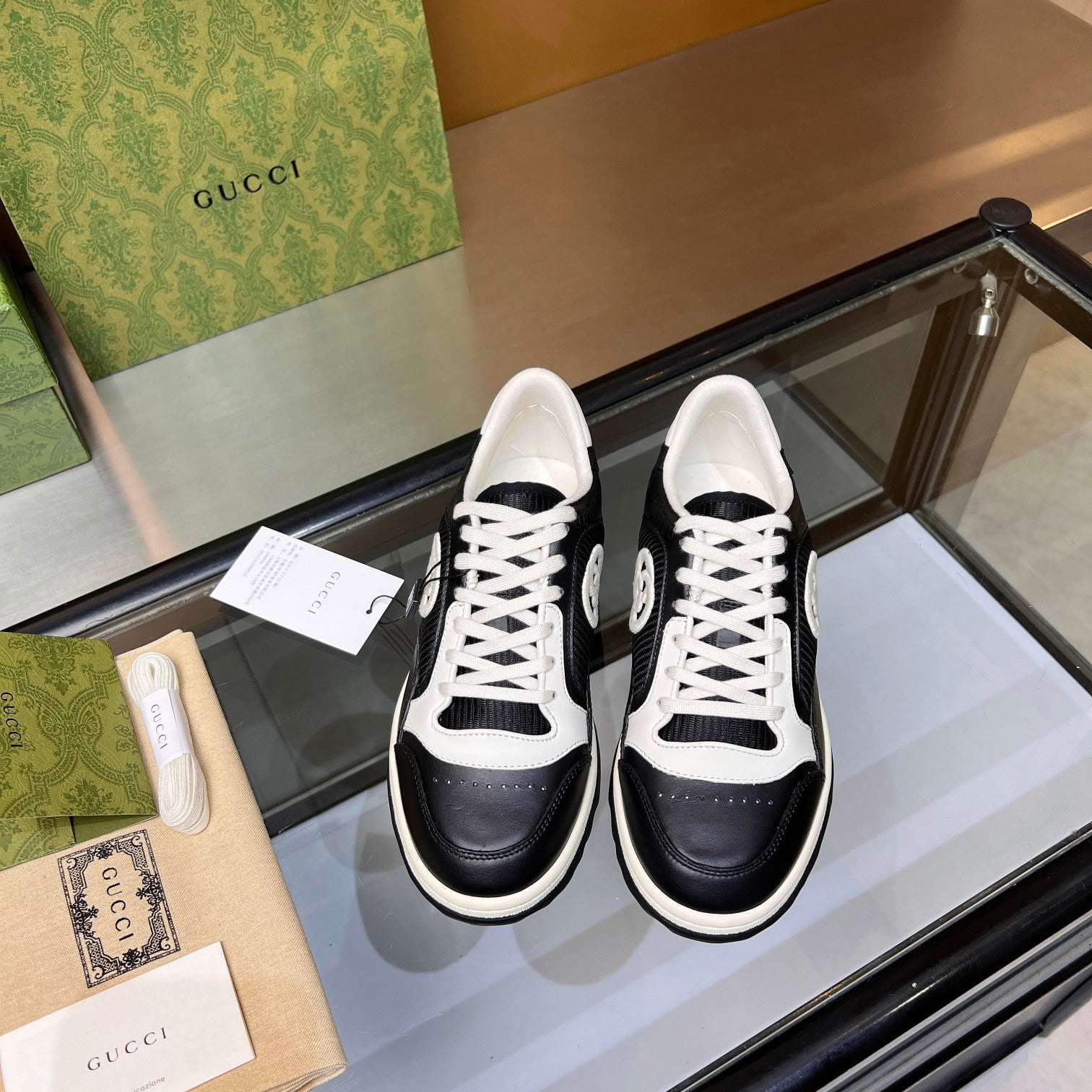 Gucci GG Interlocking Sneakers - Black & White Leather Low-Top
