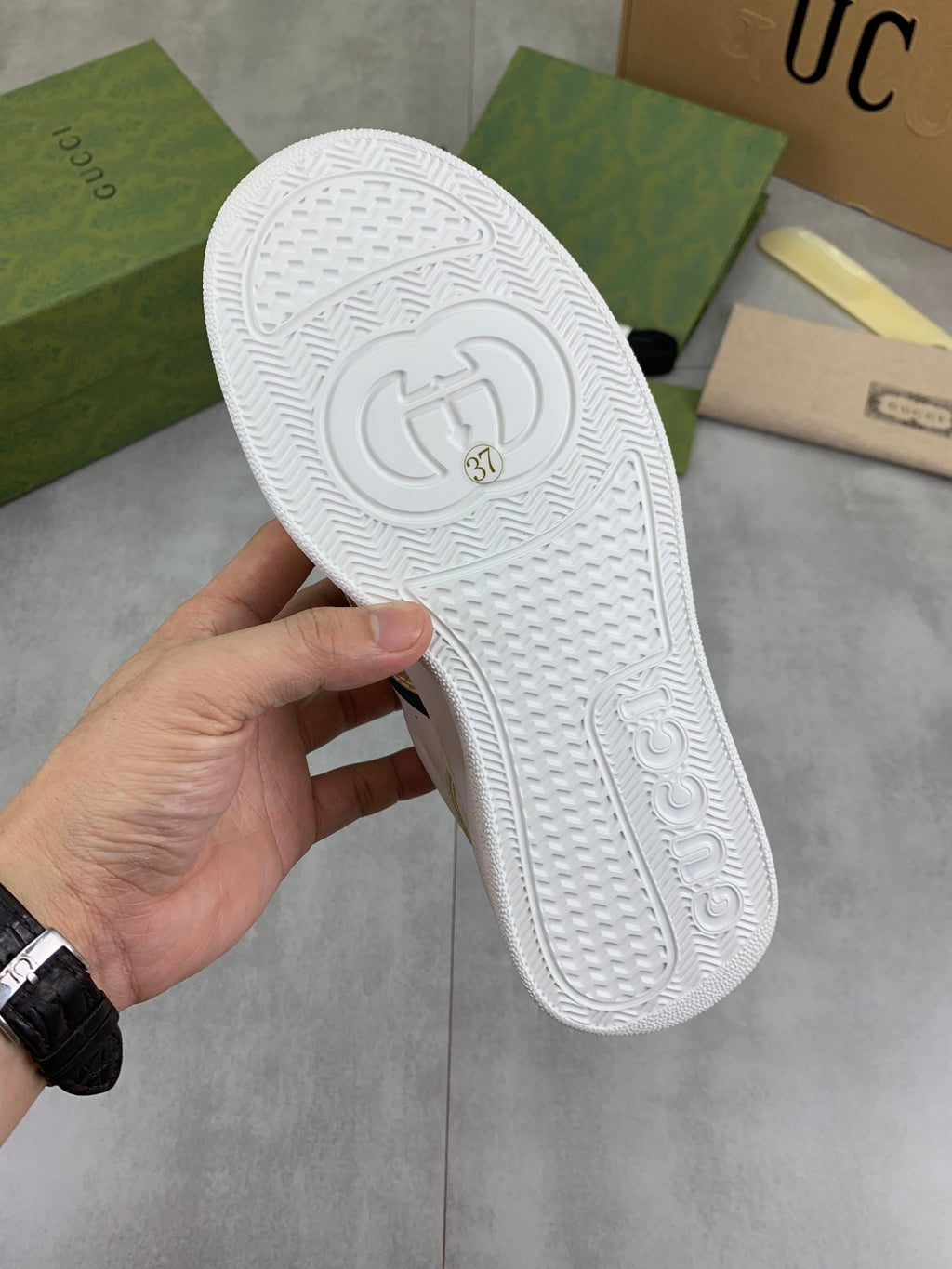 Gucci White Leather Sneakers with Gold Trim and Web Stripe