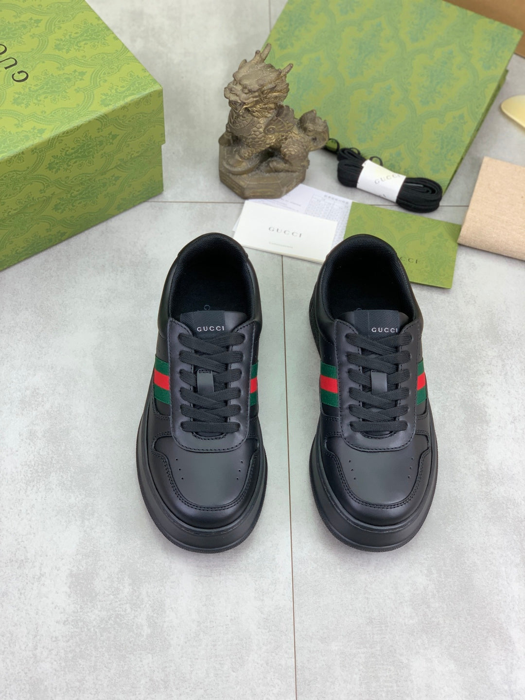 Gucci All-Black Leather Sneakers with Web Stripe