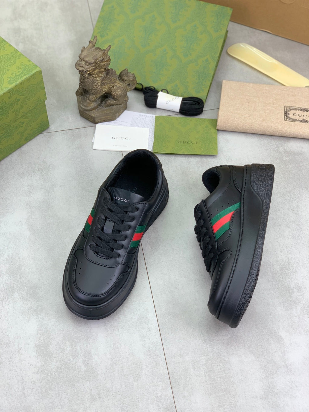 Gucci All-Black Leather Sneakers with Web Stripe