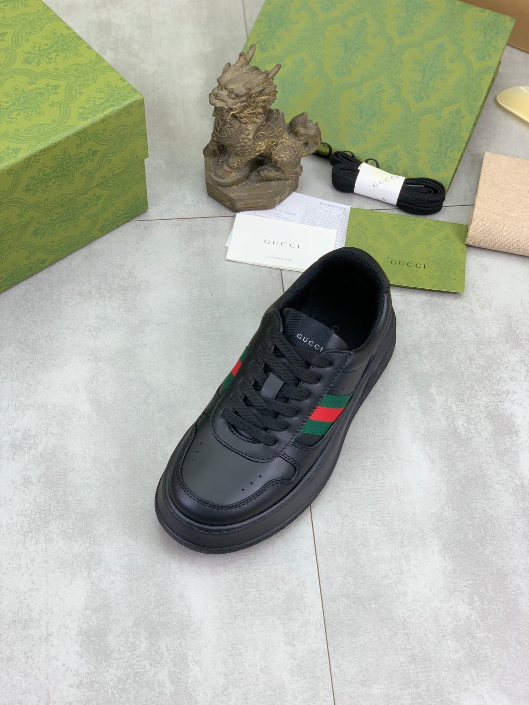 Gucci All-Black Leather Sneakers with Web Stripe