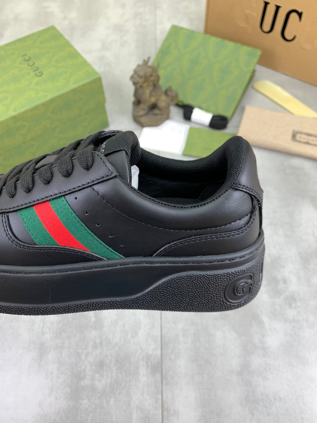 Gucci All-Black Leather Sneakers with Web Stripe