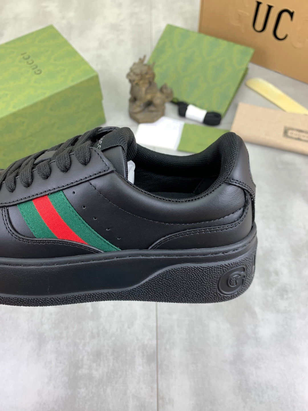 Gucci All-Black Leather Sneakers with Web Stripe