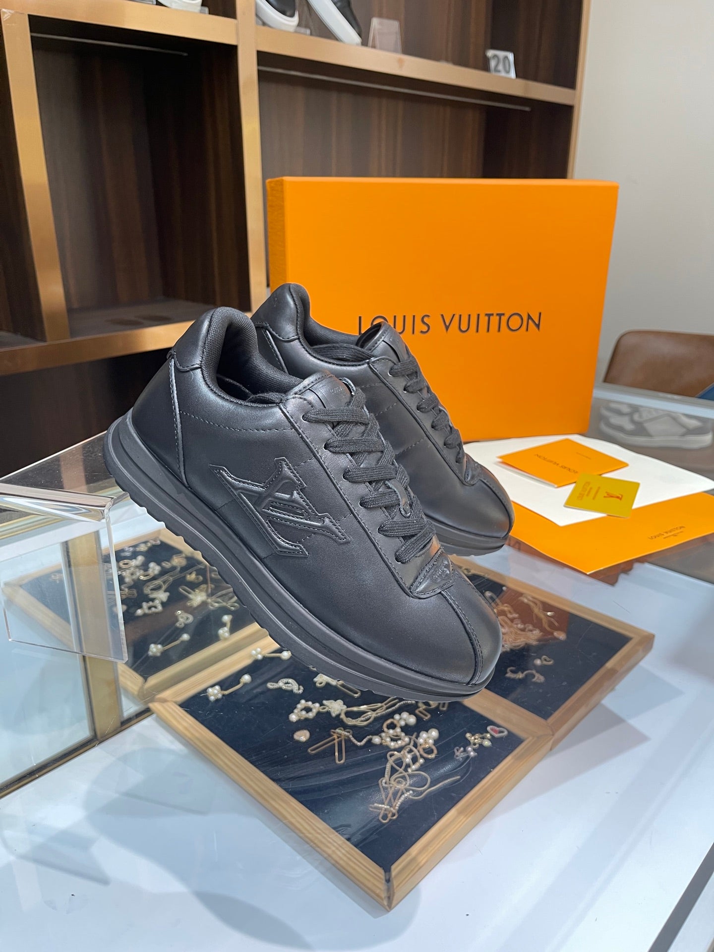 Louis Vuitton Sneakers - All-Black with Embossed LV Logo
